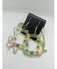 Arete resina arillo rectangular, flores .