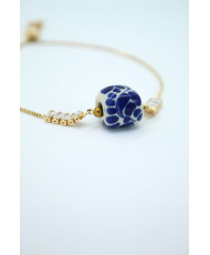 Pulsera talavera azul con aplicaciones de oro 